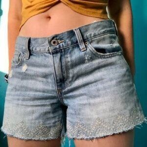 LUCKY THE CUT OFF DISTRESSED LACE TRIM SHORTS